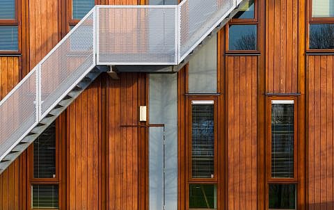modern wooden building exterior PGYUYXB 480x302 1