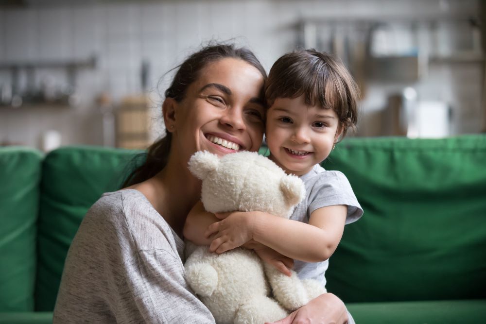 mom hugging child